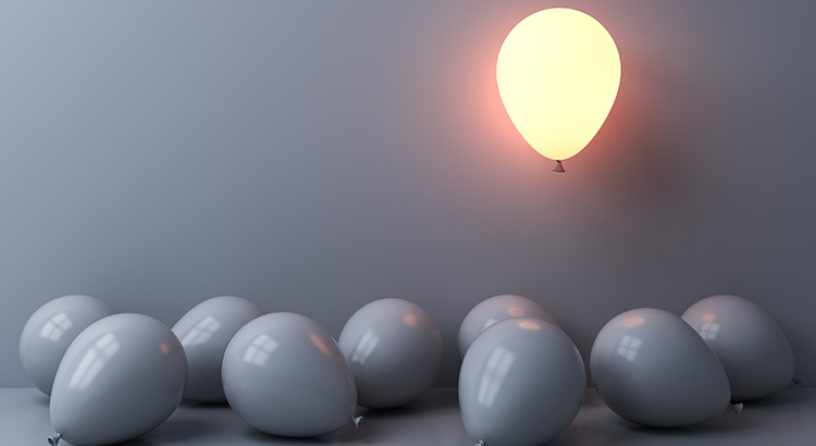 Karen Hurst - Compass- Stand out from the crowd and different concepts One light balloon glowing and floating above other white balloons on white wall background with window reflections and shadows 3D rendering