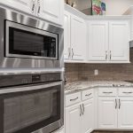 Stainless steel appliances, including built in microwave.