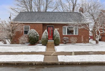 All-brick Cape Cod blending classic charm and added accessibility!