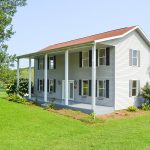 Front of a 2 story home with pillars