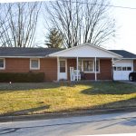 Front picture of a Brick ranch home