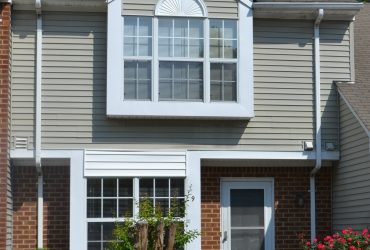 Easy commute and updated kitchen in this Hampton Woods Townhome