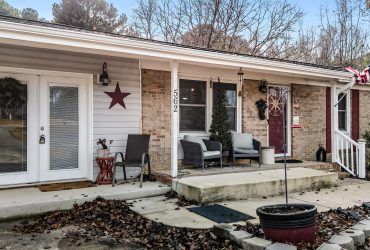 Move-In Ready Garner Ranch with Sunroom, New Deck, and Exceptional Garage/Workshop Space