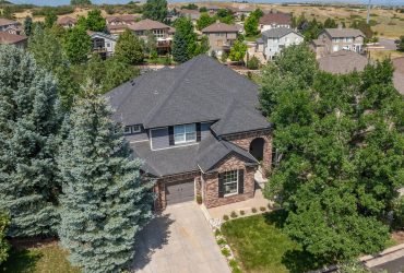 Spectacular two story home with gorgeous views on open space in prestigious Castle Pines