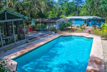 Amazing pool home situated on large private lot available on Amelia Island!