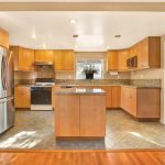 Beautifully redone kitchen with granite counter tops and island in Monterey Park