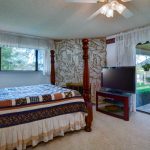 Master Bedroom with Fireplace at 12912 Garden Bar Rd Grass Valley CA 95949