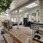 Covered back deck with skylights and ceiling fan at 16228 SW Cooper Ln Tigard OR
