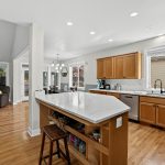 Kitchen at 16228 SW Cooper Ln Tigard with quartz counters, full-height quartz backsplash and large island